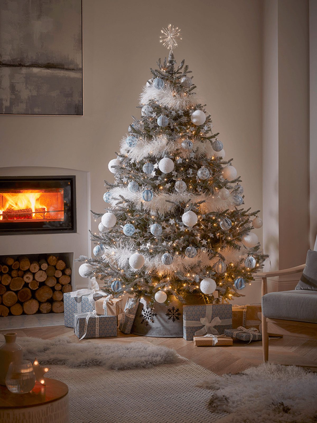 Cozy Winter Living Room with Blue and White Christmas Tree Accents — Winter Wonderland Christmas Decor