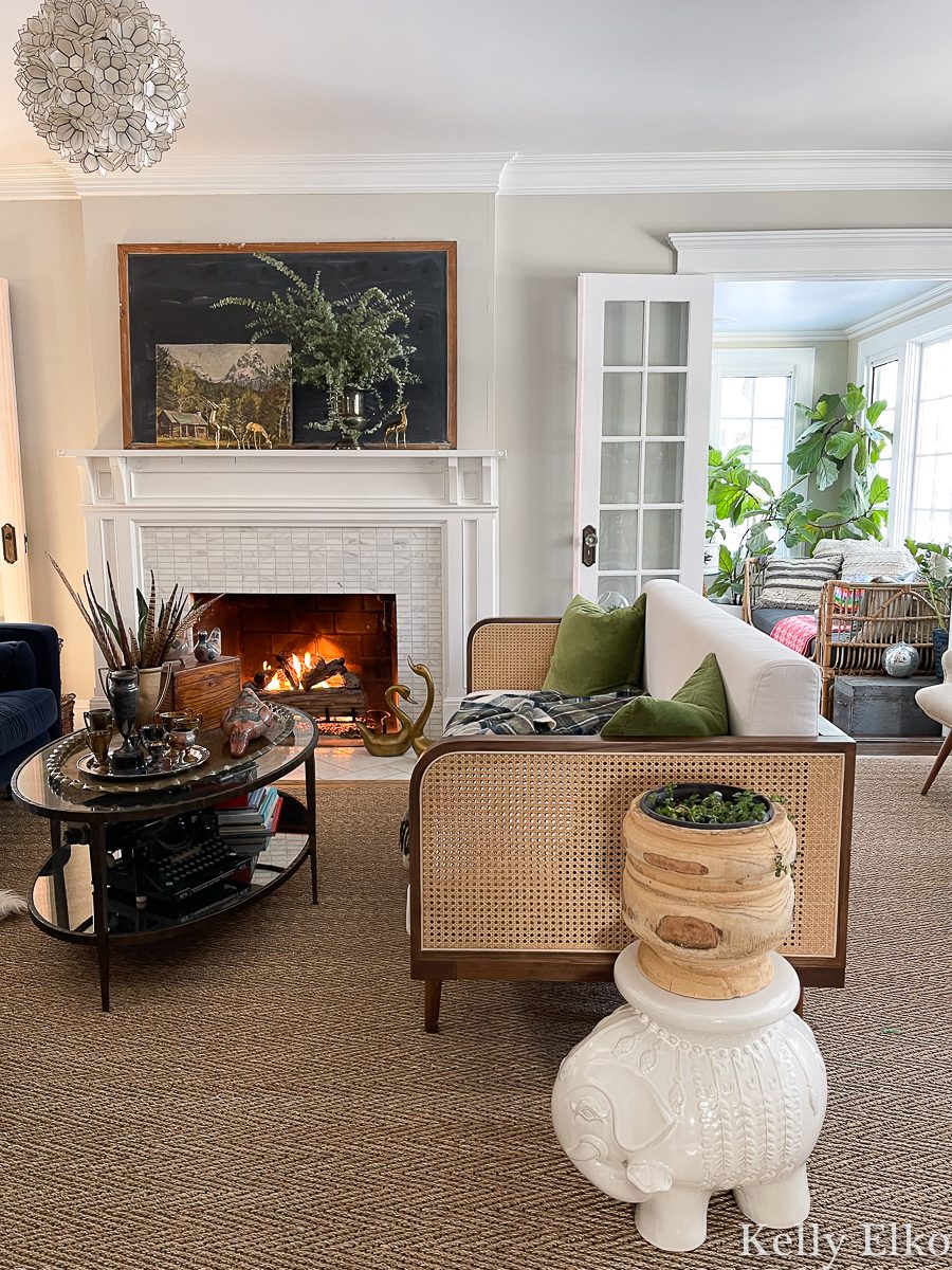 Eclectic Living Room with Cane Sofa and Fireplace Eclectic Living Room with Cane Sofa and Fireplace — Winter Decor After Christmas