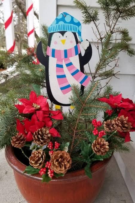 Festive Outdoor Planter with Penguin Decoration — Dollar Tree Christmas Decor