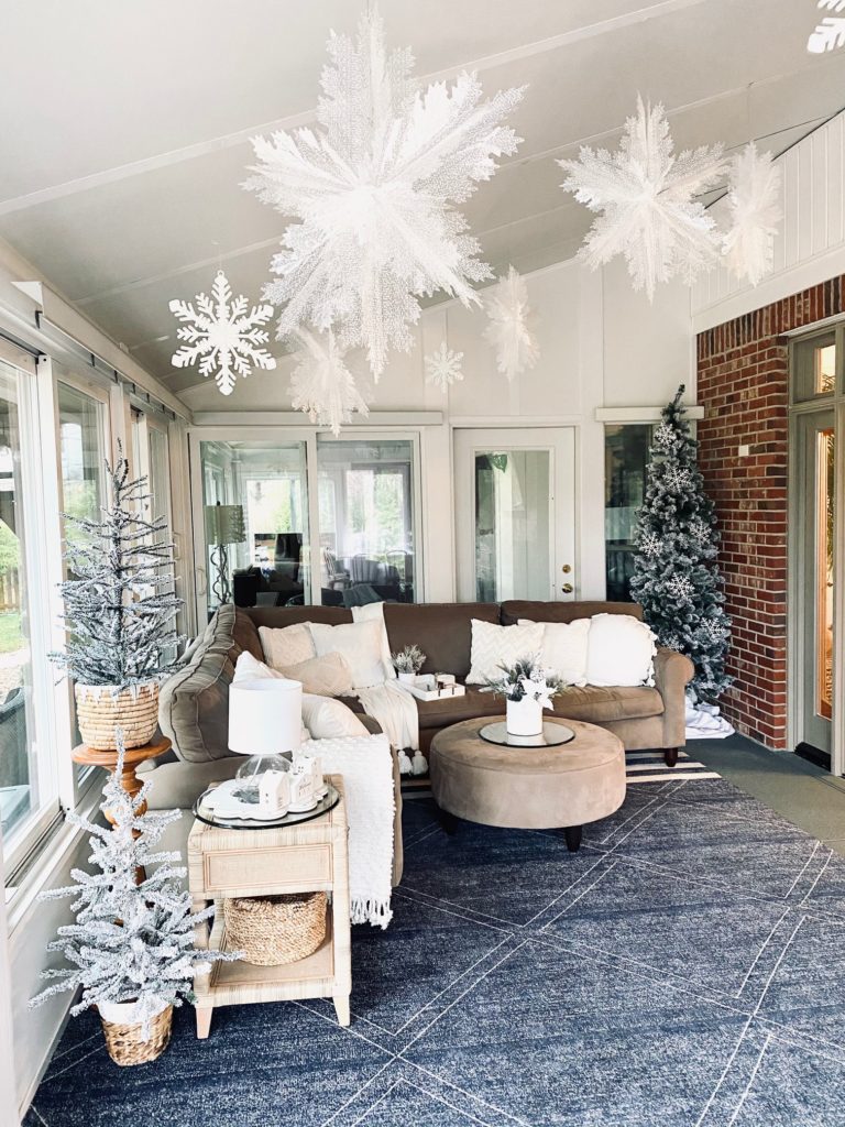 Sunroom Decorated with Large Hanging White Snowflake Decorations Sunroom Decorated with Large Hanging White Snowflake Decorations — White Christmas Decor