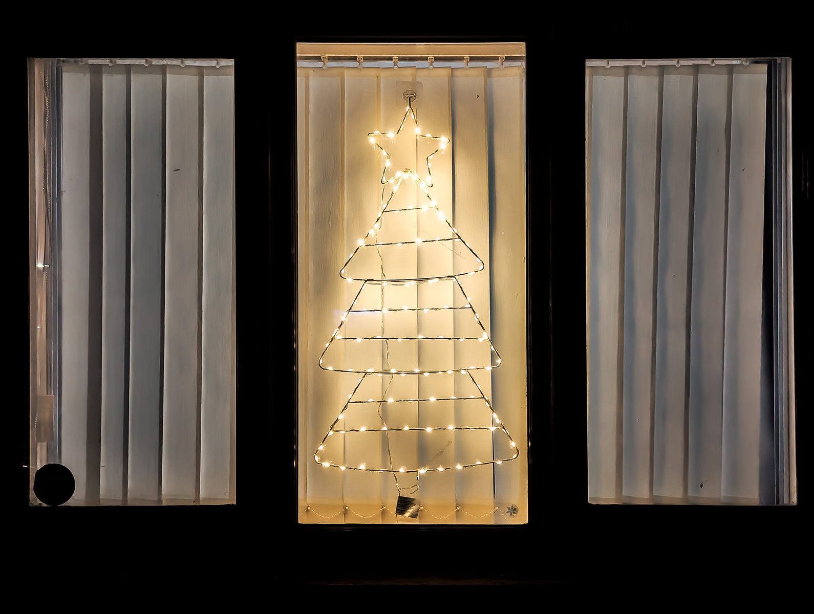 Illuminated Wireframe Christmas Tree for a Modern Window Statement — Christmas Fairy Lights Window
