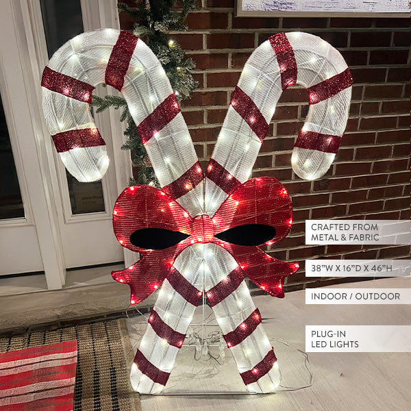 Illuminated Candy Canes for a Welcoming Entrance — Candy Cane Christmas Decor