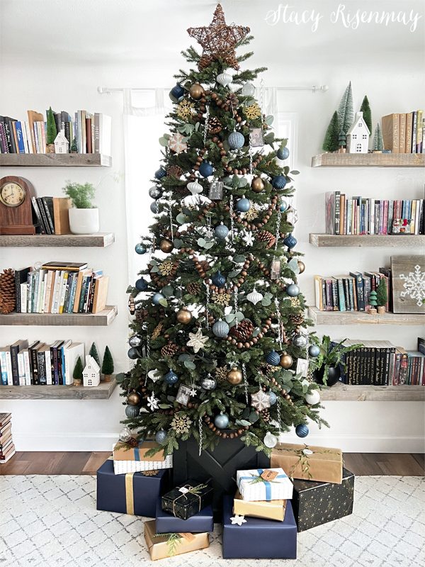 Christmas Tree Decorating a Living Room with Floor-to-Ceiling Bookshelves — Winter Wonderland Christmas Decor