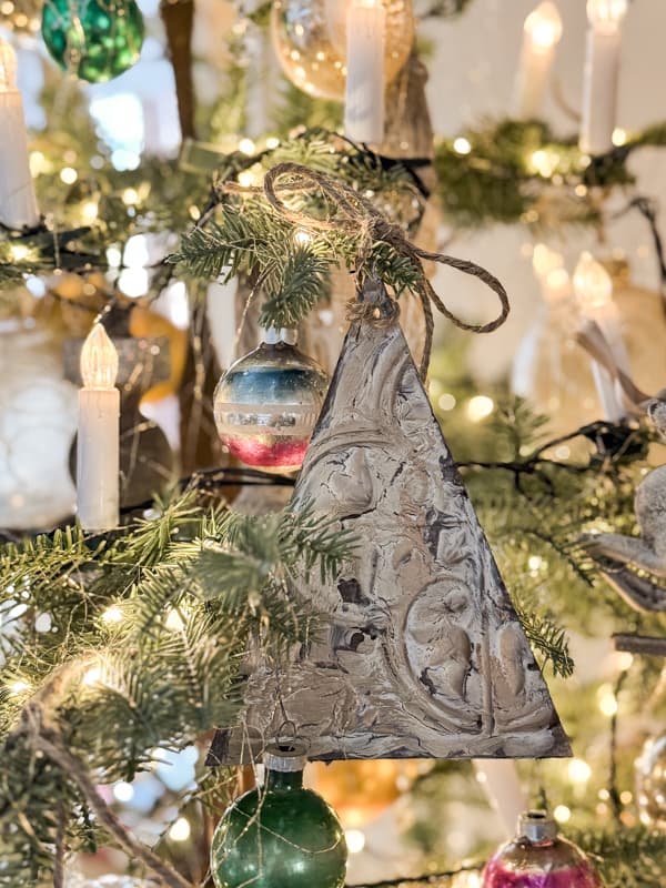 Vintage-Inspired Metal Bell and Glass Ornaments on a Tree — Dollar Tree Christmas Decor