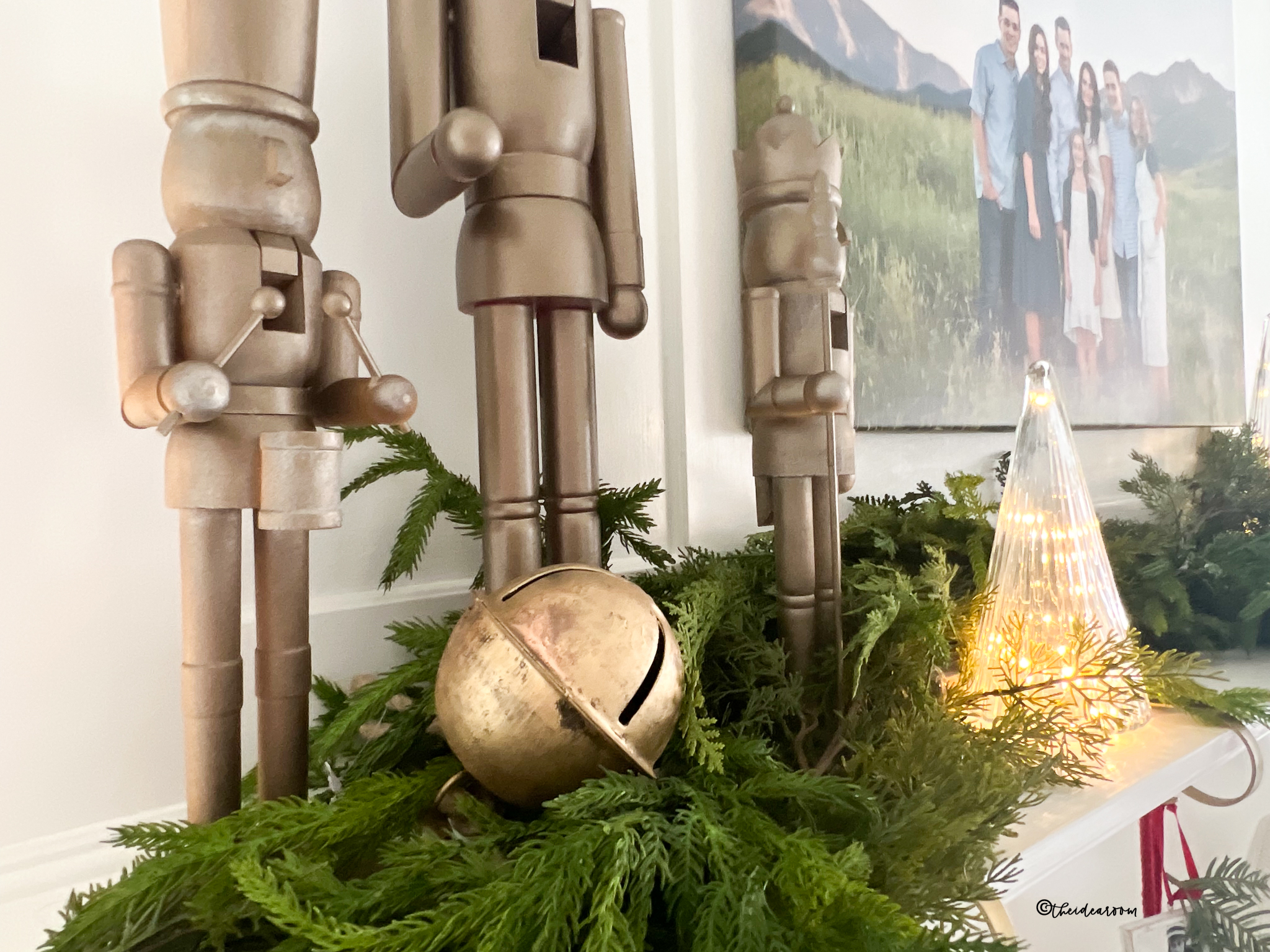 Metallic Nutcrackers on a Mantel with Greenery Metallic Nutcrackers on a Mantel with Greenery — Nutcracker Christmas Decor