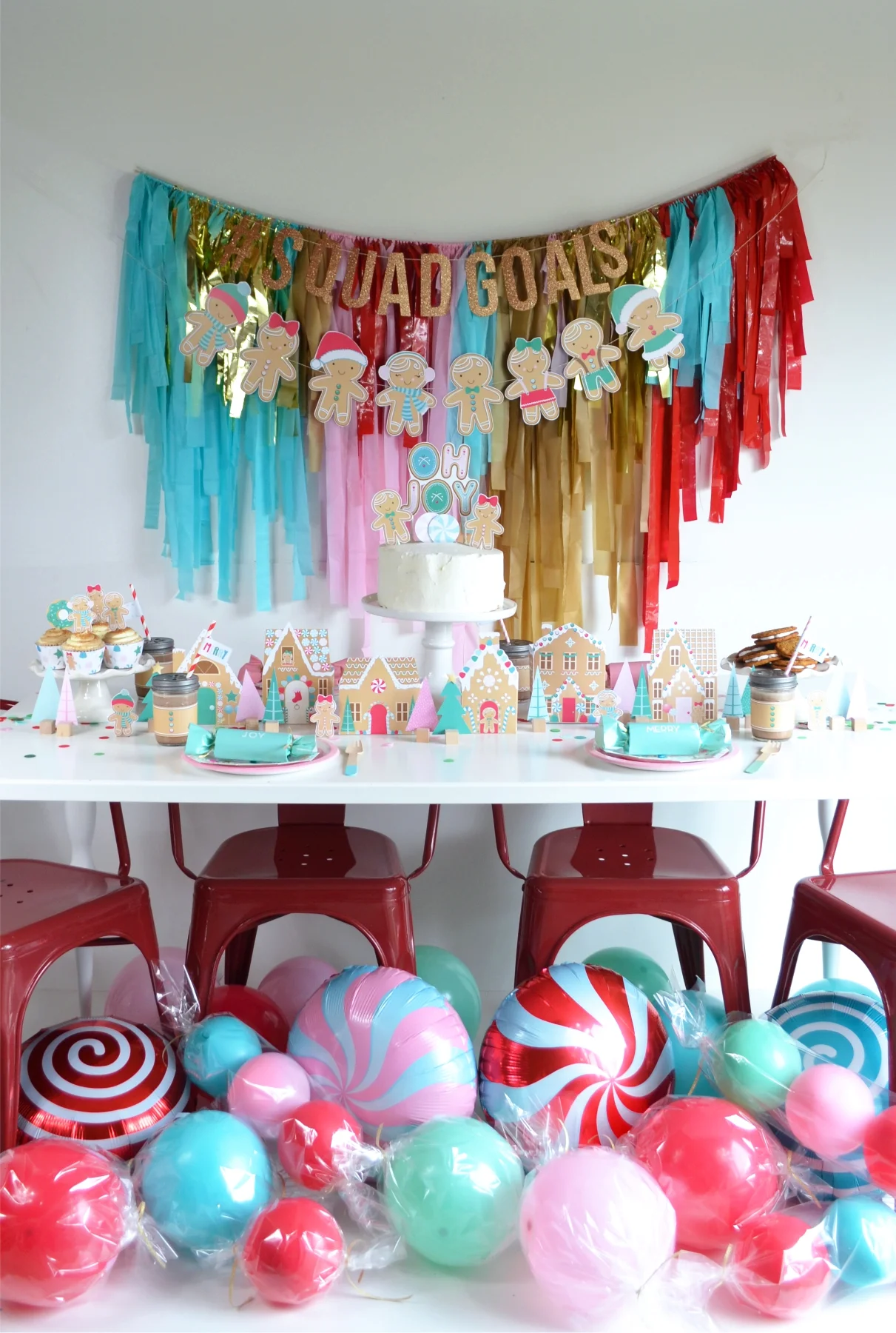 Whimsical Party Backdrop with Fringe and Gingerbread Banner — Christmas Party Decor