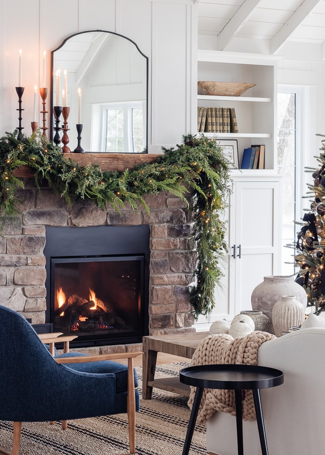 Rustic Stone Fireplace with Textured Knit Throw and Crackling Fire Rustic Stone Fireplace with Textured Knit Throw and Crackling Fire — Christmas Fireplace Decor