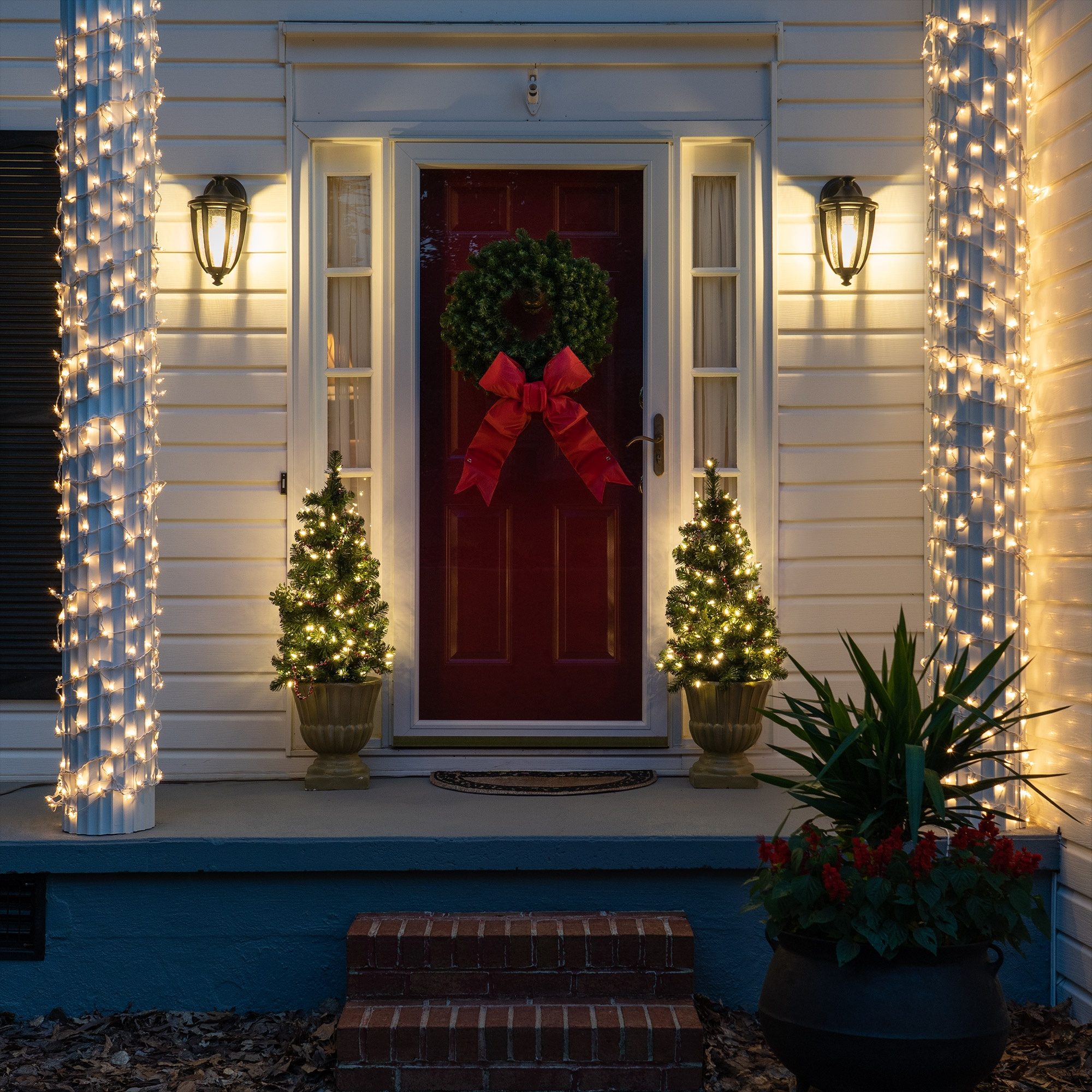 Traditional Porch with Glowing String Lights and Mini Trees — Simple Christmas Outdoor Decor