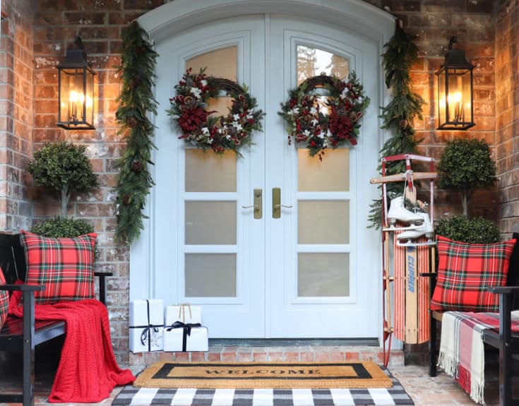 Front Porch White Double Door with Plaid Accents and Vintage Sled Front Porch White Double Door with Plaid Accents and Vintage Sled — Christmas Front Door Decor