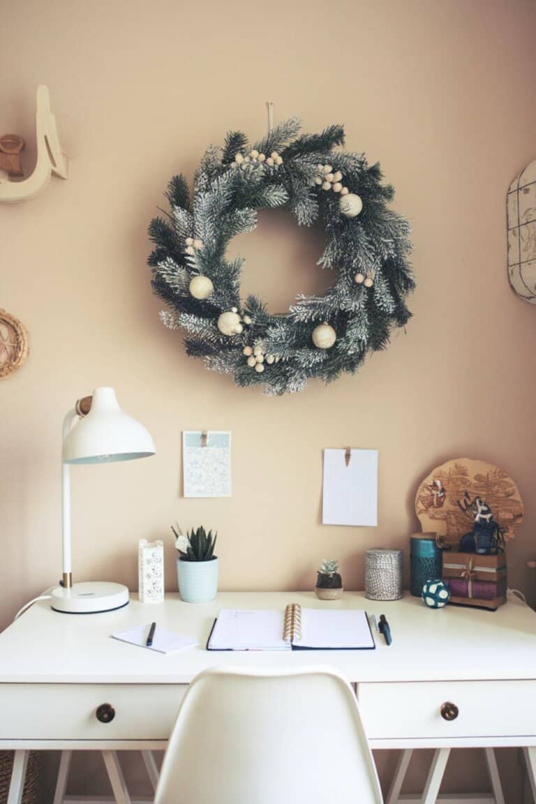 Large Frosted Wreath as a Wall Statement — Christmas Office Decor Ideas
