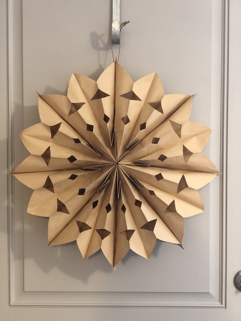 Large Kraft Paper Snowflake Decoration on Grey Door — Paper Snowflakes