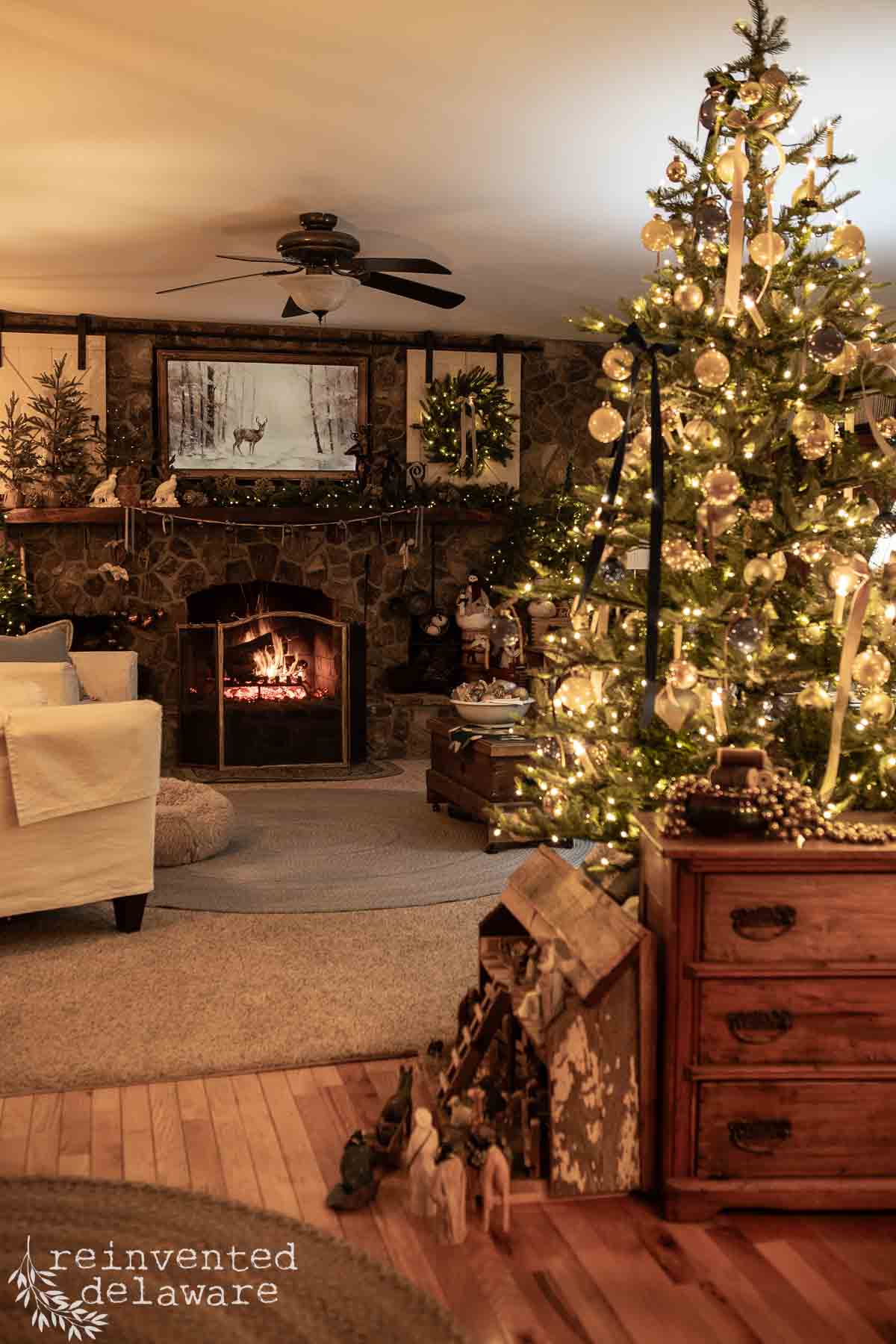 Elegant Tree by a Stone Fireplace with Warm Evening Lighting — Elegant Christmas Tree