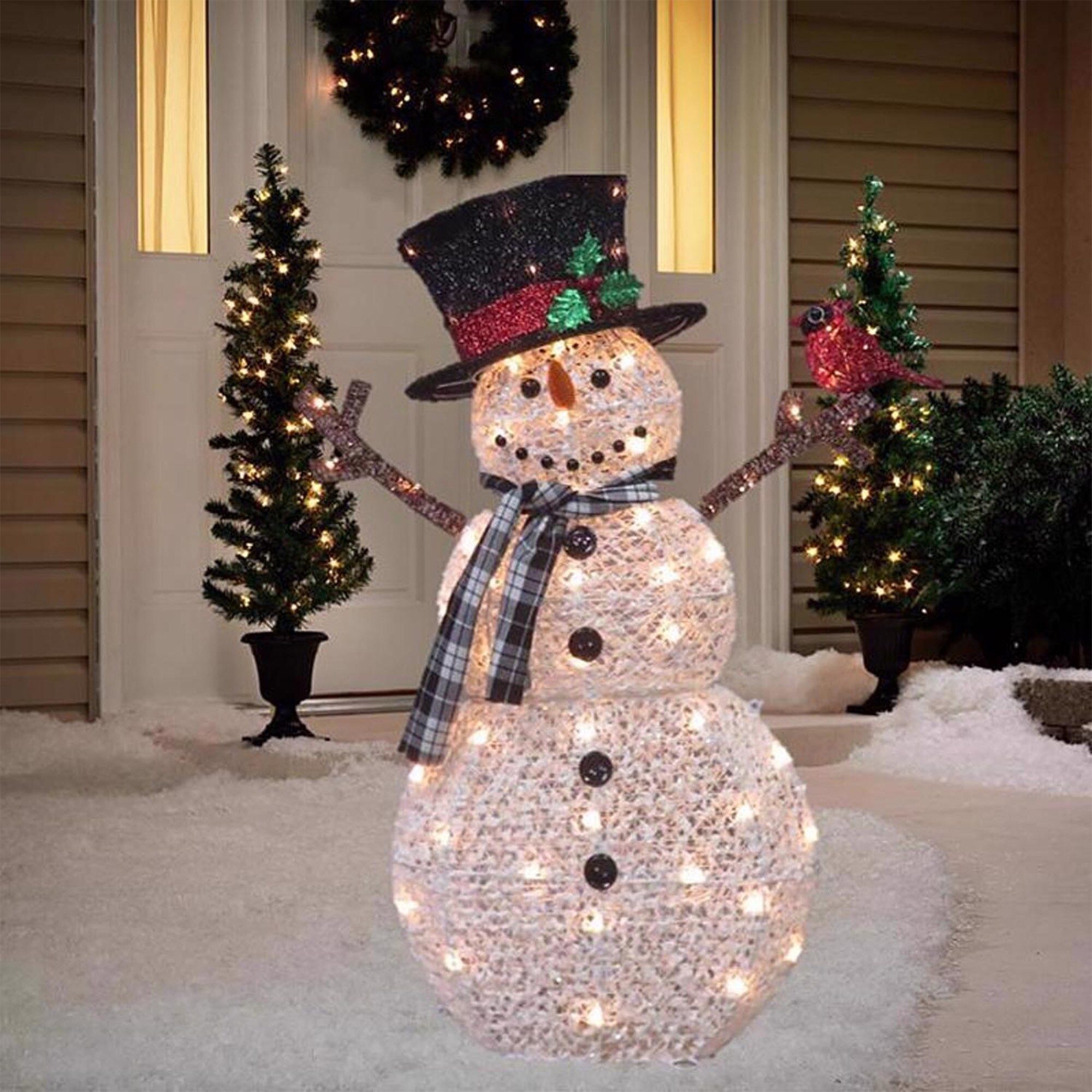 White Lantern Diorama with a Snowman Scene on a Mantelpiece White Lantern Diorama with a Snowman Scene on a Mantelpiece — White Christmas Decor