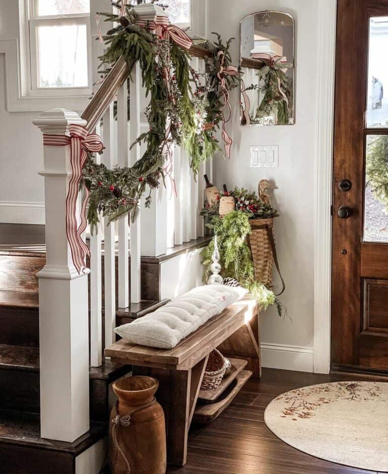 Farmhouse Staircase with Striped Ribbons Farmhouse Staircase with Striped Ribbons — Christmas Staircase Decor