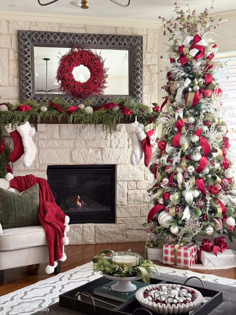 Stone Fireplace with Garland and a Tall Christmas Tree Stone Fireplace with Garland and a Tall Christmas Tree — Cozy Christmas Decor
