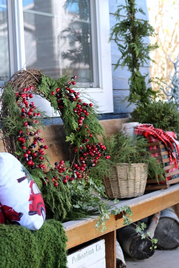 Rustic Farmhouse Wreath on a Wooden Bench with Plaid Accents — DIY Christmas Wreath