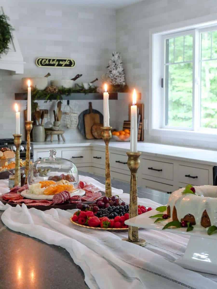Kitchen Island Food Spread with Brass Candlesticks and Festive Decor — Christmas Party Decor