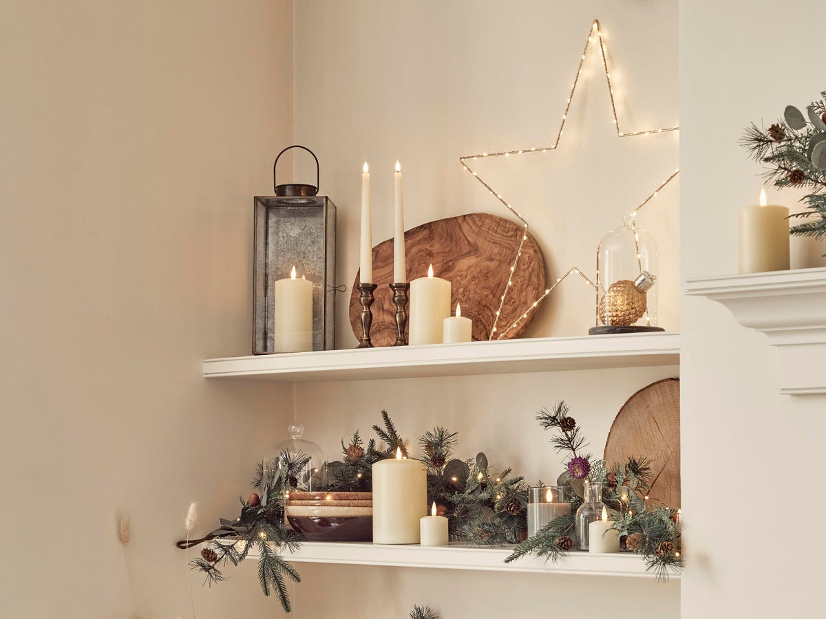 Modern Cozy Shelves with Starburst Light and Candles Modern Cozy Shelves with Starburst Light and Candles — Christmas Shelf Decor