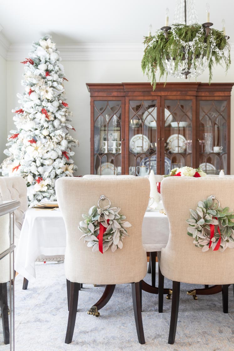 Traditional Dining Chairs Adorned with Festive Wreaths — Christmas Dining Room Decor