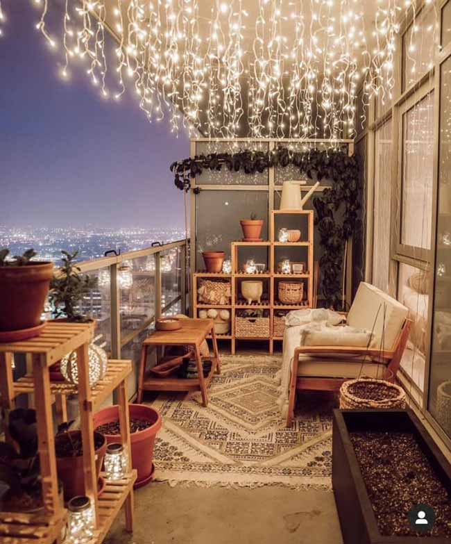 Magical Winter Wonderland with Cascading String Lights on Balcony — Christmas Balcony Decor