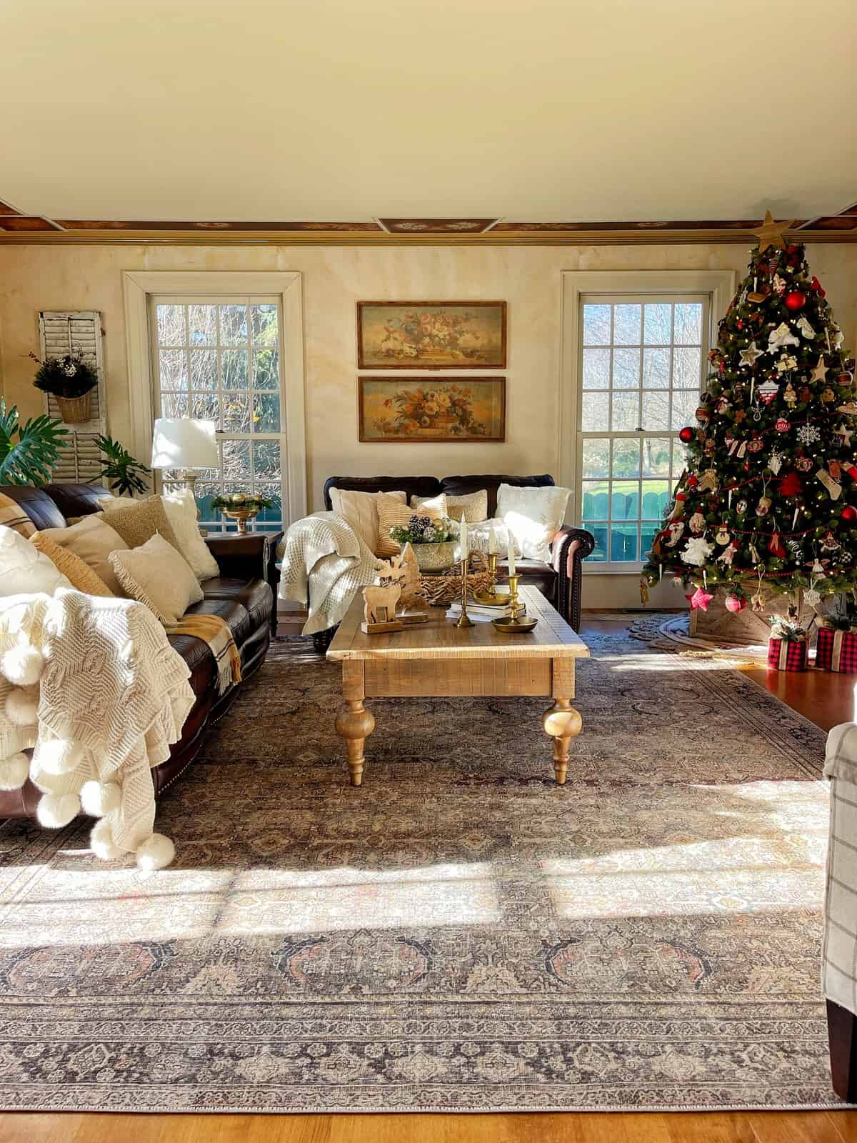 Sunlit Farmhouse Living Room with Cozy Seating and Tree — Farmhouse Christmas Decor