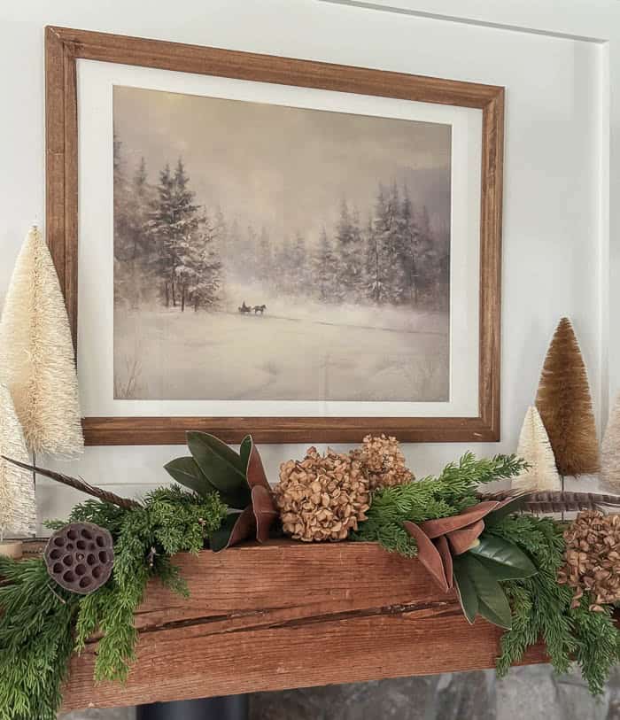 Rustic Mantel with Natural Greenery, Magnolia Leaves, and Bottle Brush Trees Rustic Mantel with Natural Greenery, Magnolia Leaves, and Bottle Brush Trees — Christmas Fireplace Decor