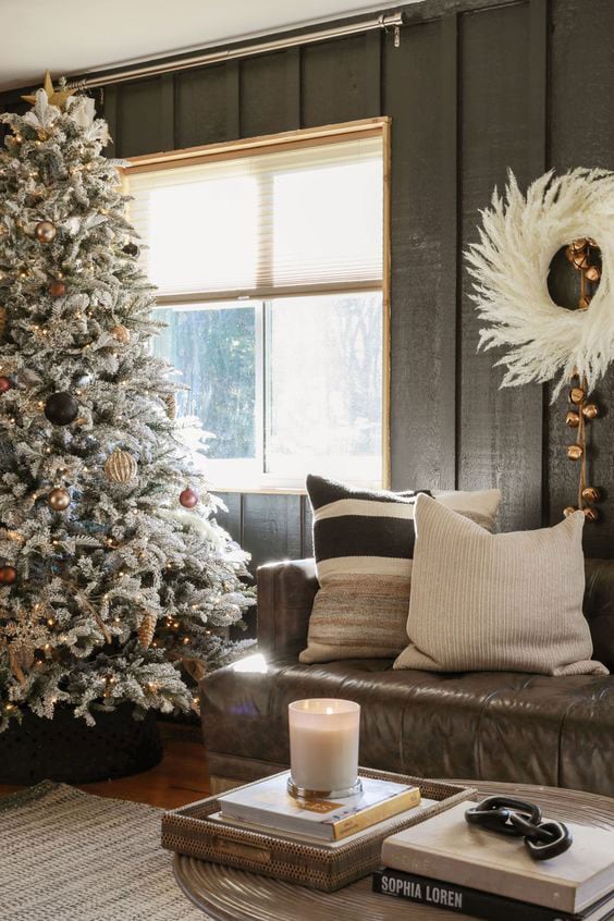 Modern Rustic Living: Flocked Tree next to Leather Sofa Modern Rustic Living: Flocked Tree next to Leather Sofa — Flocked Christmas Tree Decor