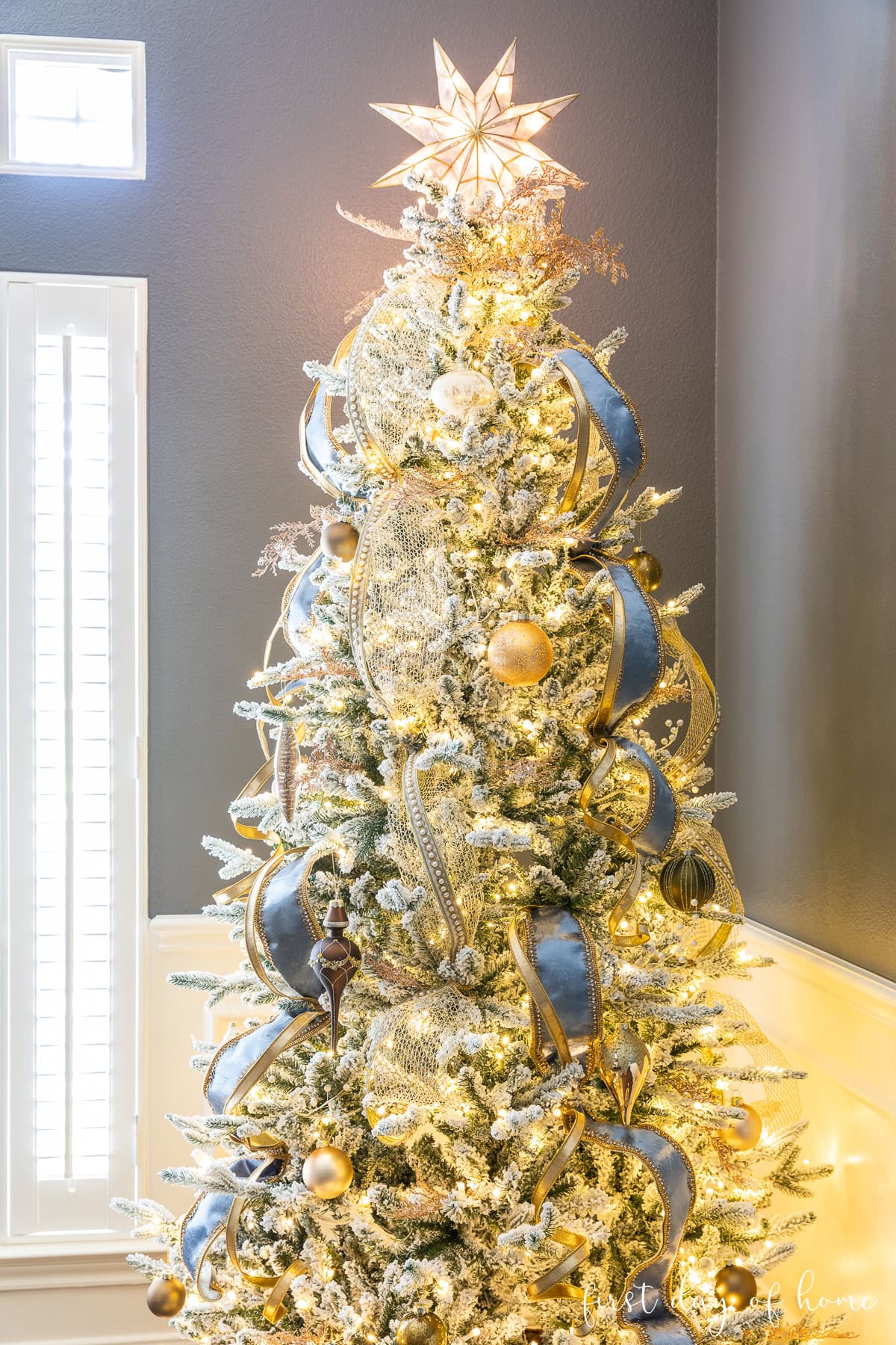 Elegant Blue and Gold: Flocked Tree with Star Topper Elegant Blue and Gold: Flocked Tree with Star Topper — Flocked Christmas Tree Decor