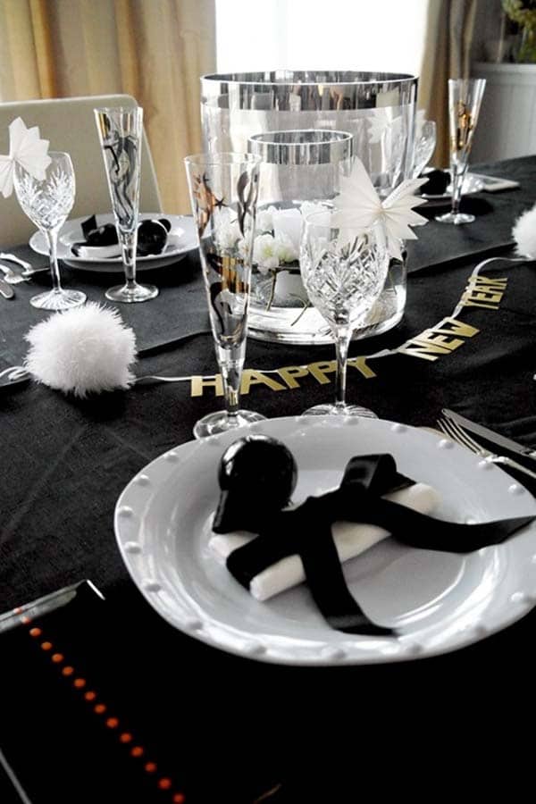 Elegant Black and Gold Table Setting with Crystal Glasses — New Years Eve Party Decor
