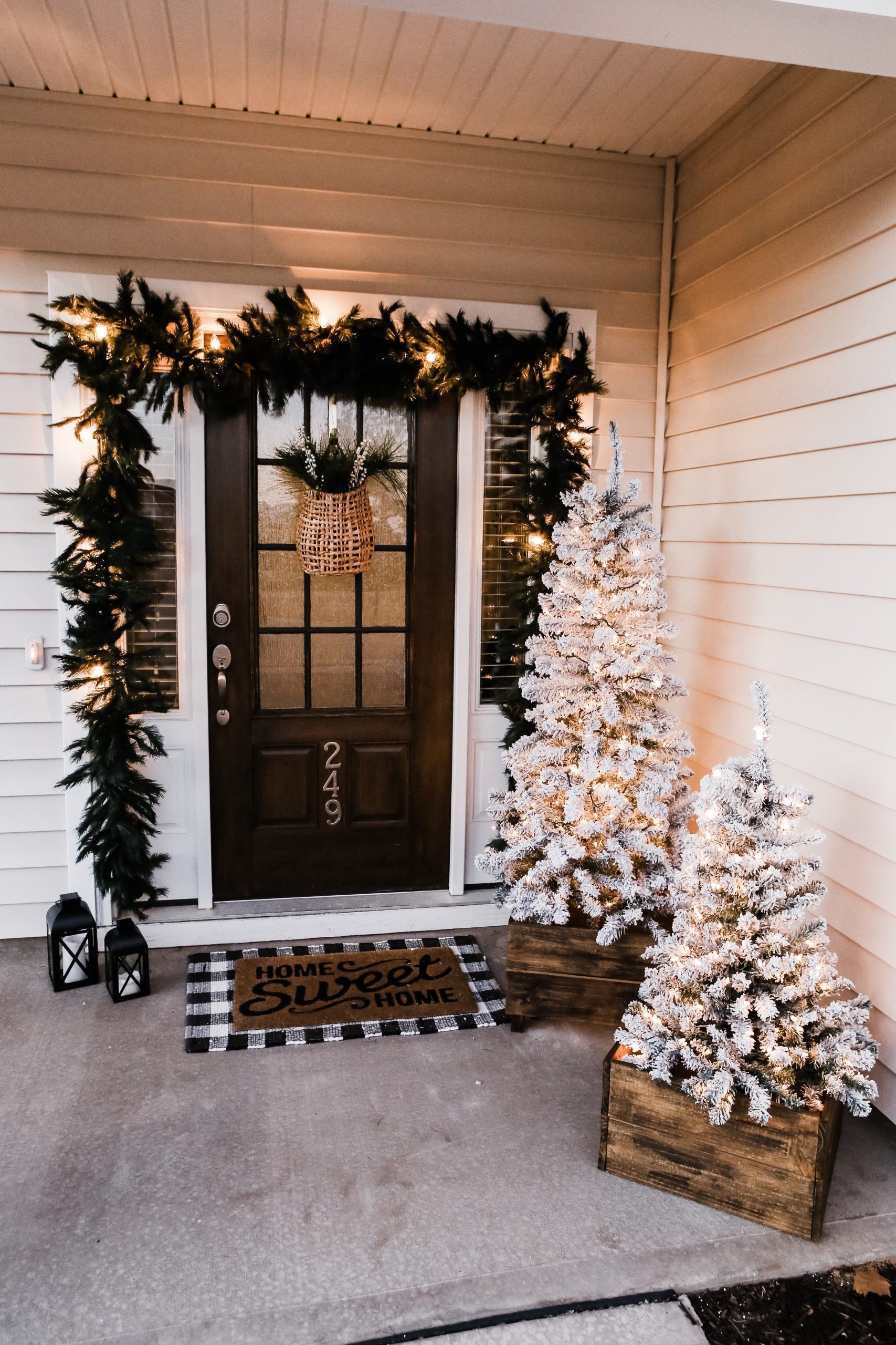 Modern Christmas Porch with Illuminated Flocked Trees Modern Christmas Porch with Illuminated Flocked Trees — Christmas Porch Decor