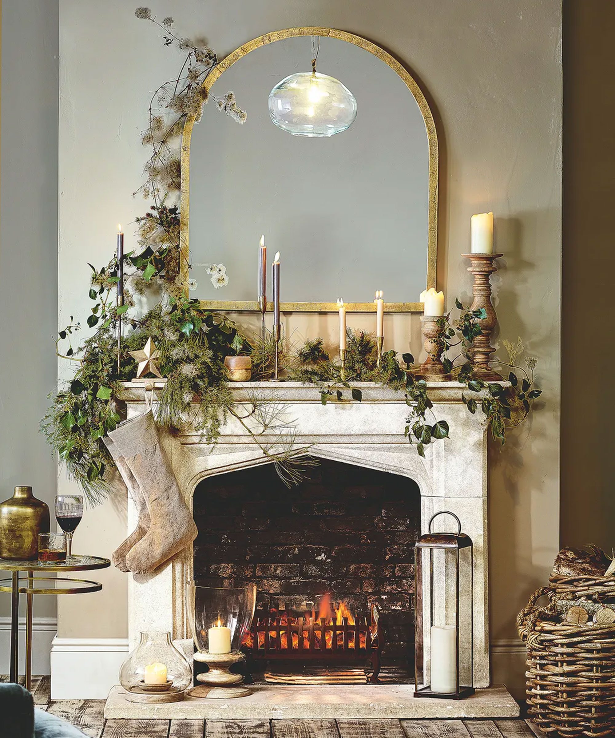 Farmhouse Fireplace with Lush Green Garland and Lantern — Rustic Christmas Decor