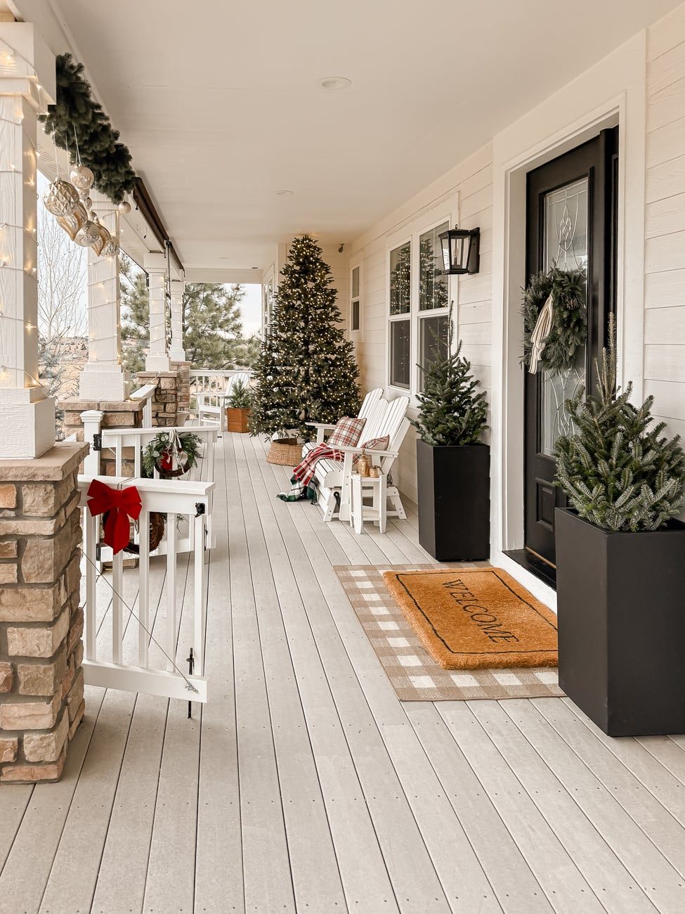 Evening Ambiance: Illuminated Farmhouse Porch with Adirondack Chairs — Farmhouse Christmas Porch