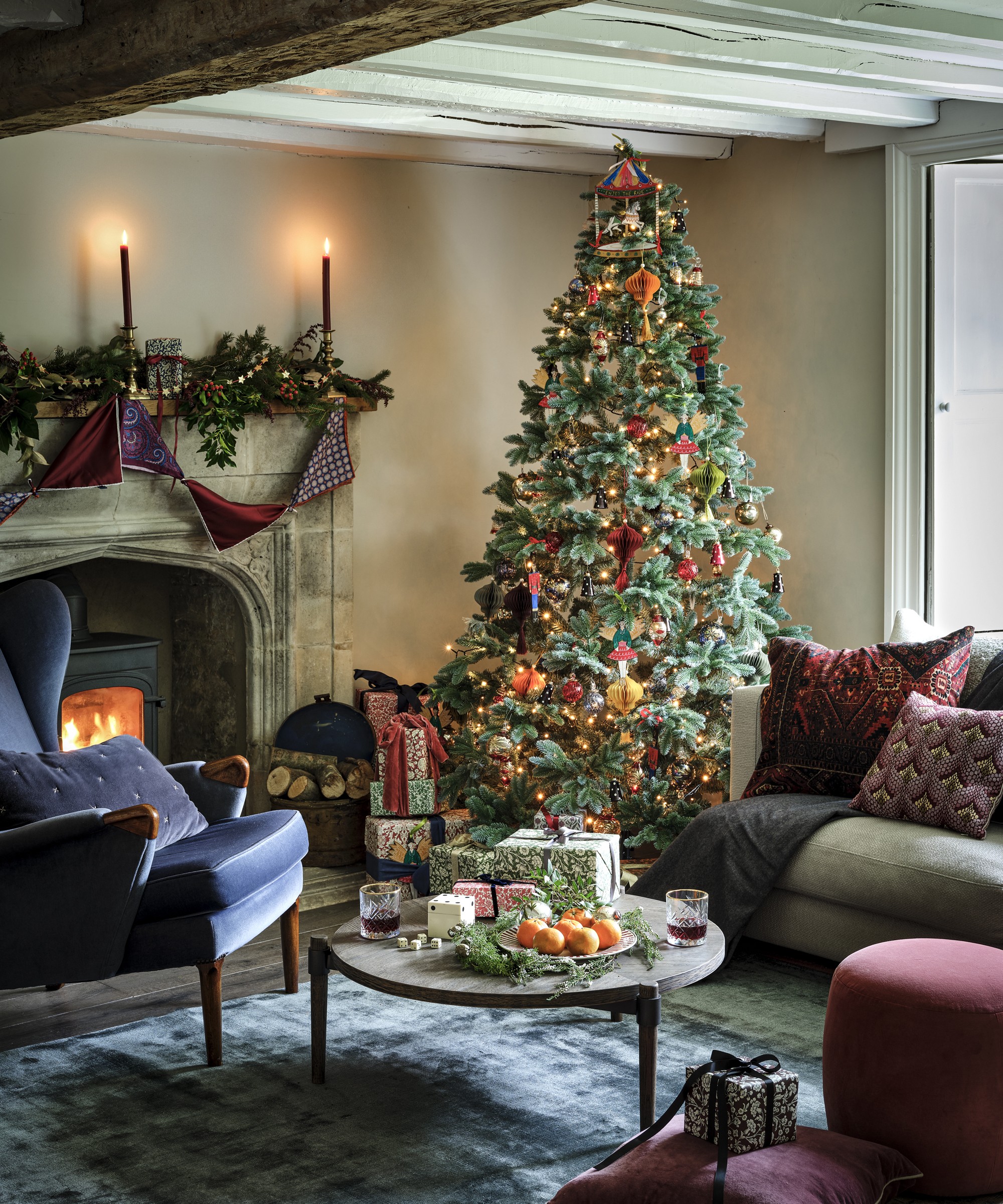 Cozy Traditional Tree with Colorful Ornaments and Fireplace — Christmas Tree Color Schemes