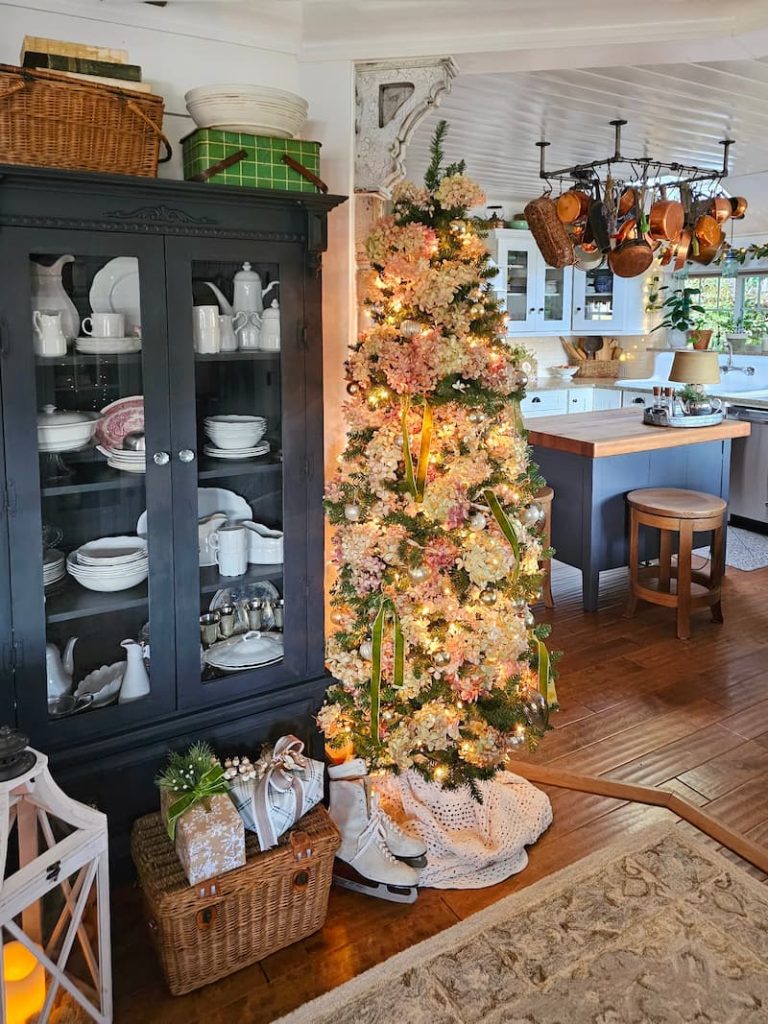 Wide Room Shot Cozy Farmhouse Living Room Corner with Christmas Tree Wide Room Shot Cozy Farmhouse Living Room Corner with Christmas Tree — Sage Green Christmas Decor