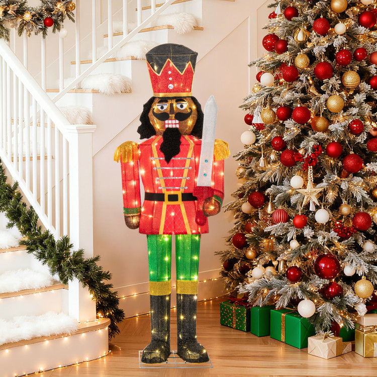Large Lighted Nutcracker Centered in a Festive Entryway Large Lighted Nutcracker Centered in a Festive Entryway — Nutcracker Christmas Decor