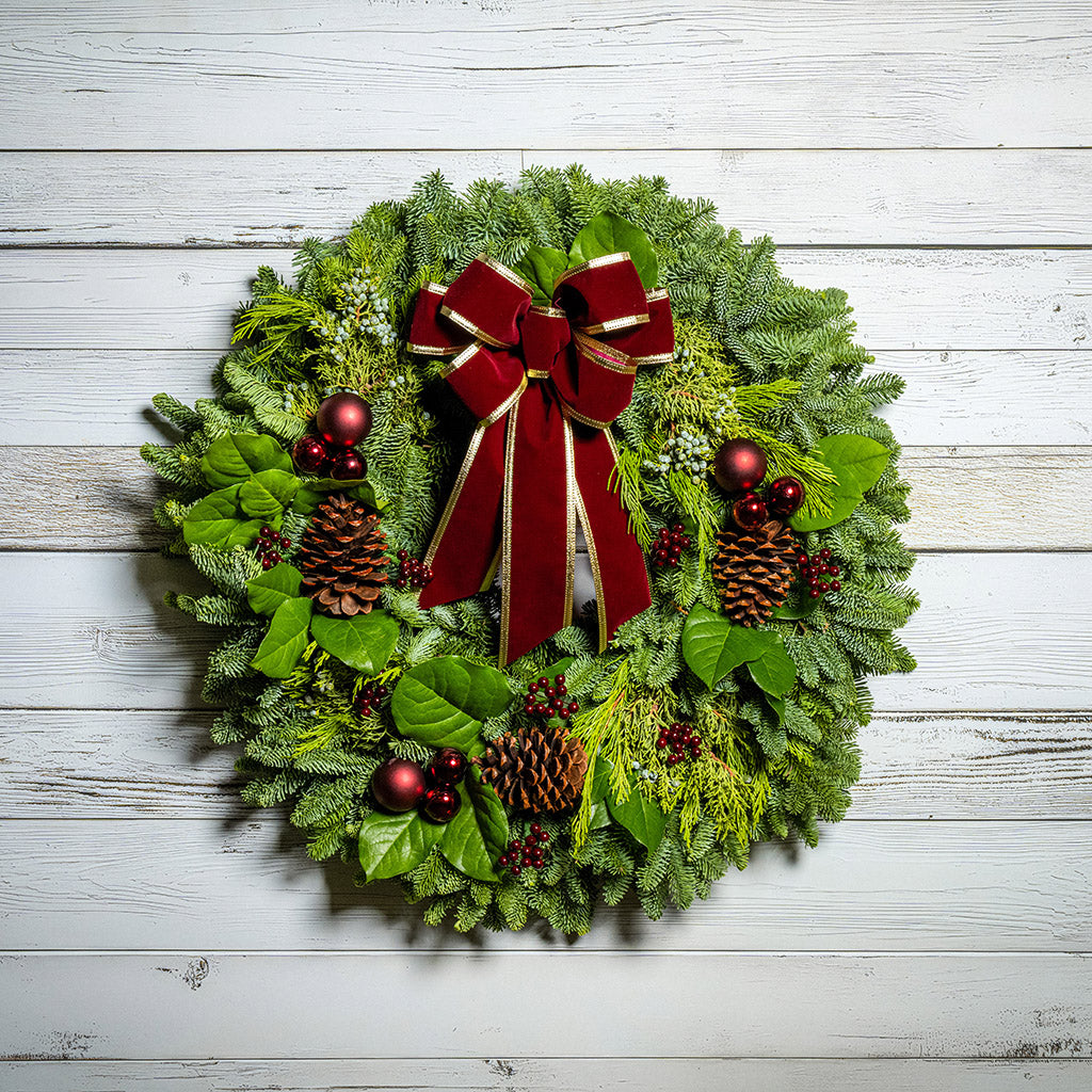 Large Christmas Wreath with a Prominent Burgundy Velvet Bow — Burgundy Christmas Decor