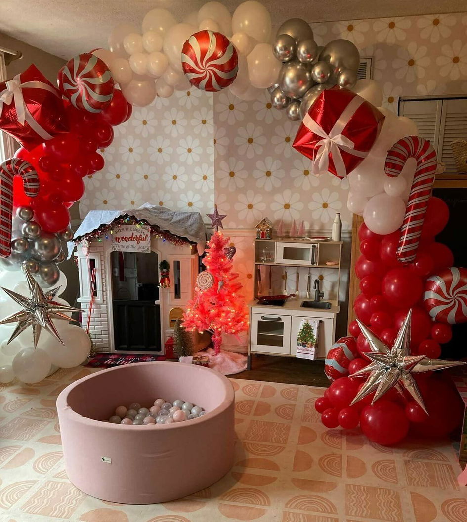 Whimsical Red, White, and Silver Balloon Garland in a Playroom Whimsical Red, White, and Silver Balloon Garland in a Playroom — Christmas Balloon Garland