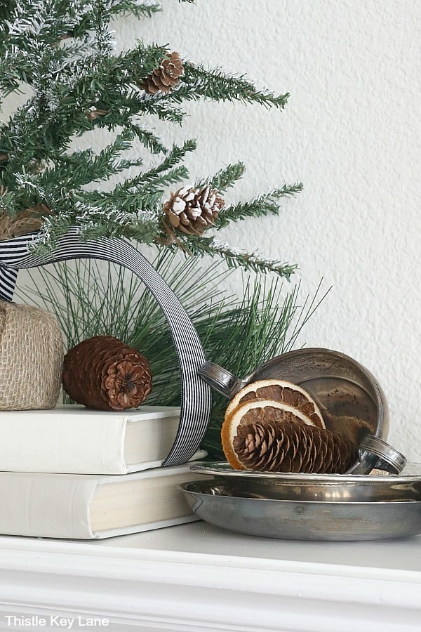 Rustic Mantel with Miniature Tree and Dried Oranges Rustic Mantel with Miniature Tree and Dried Oranges — Winter Decor After Christmas