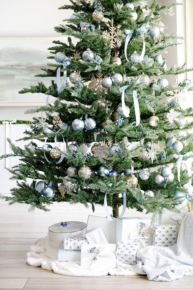 Wide Room Shot Modern Blue and Silver Christmas Tree with Gifts Wide Room Shot Modern Blue and Silver Christmas Tree with Gifts — Blue Christmas Decor