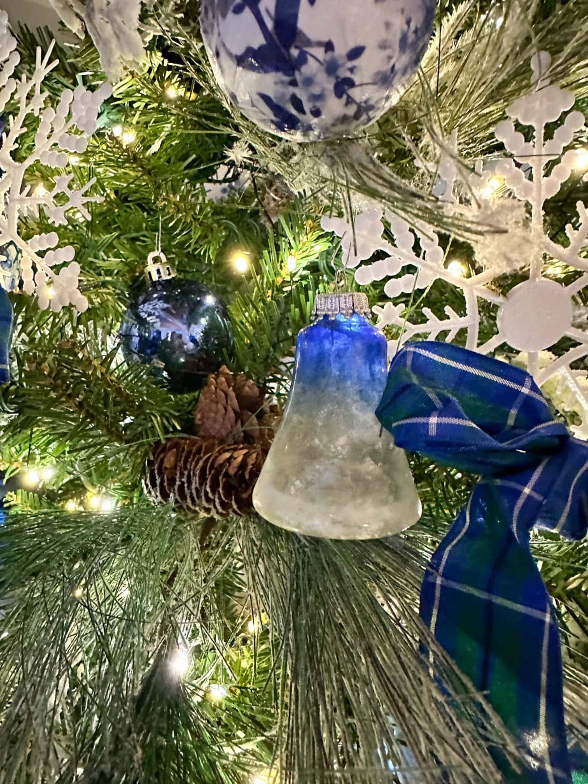 French Country Detail: Blue and White Bell Ornament with Plaid — Christmas Tree Color Schemes
