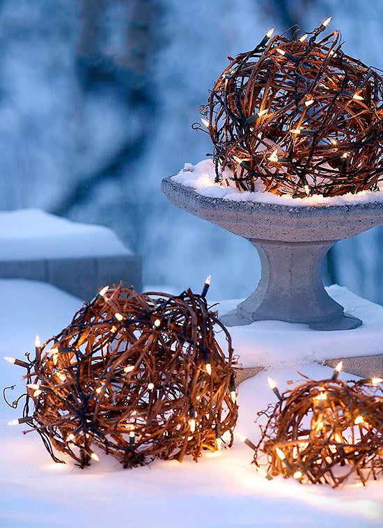 Rustic Grapevine Orbs with Lights in Snowy Garden — Outdoor Christmas Lights