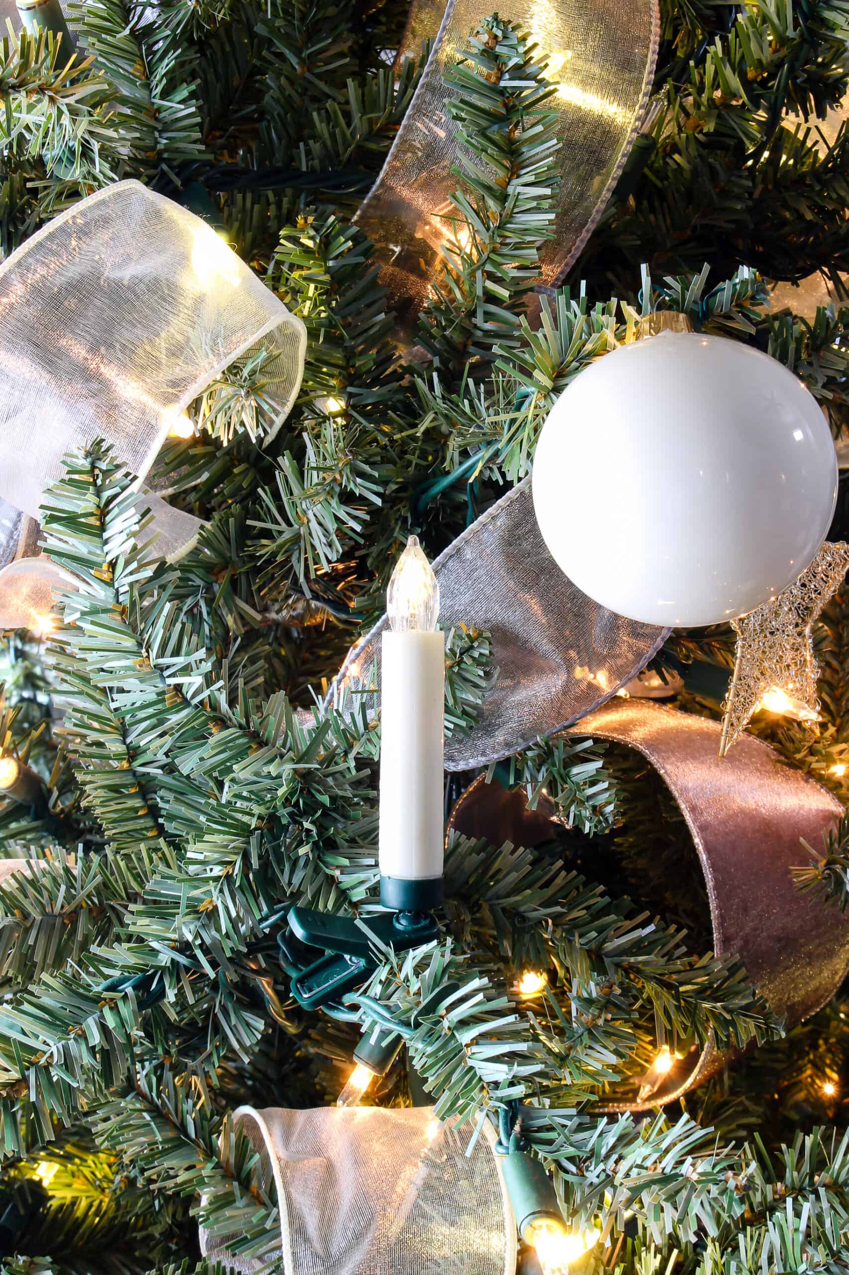 Close-Up Texture of Artificial Pine Branches and Shimmering Ribbons — Elegant Christmas Tree