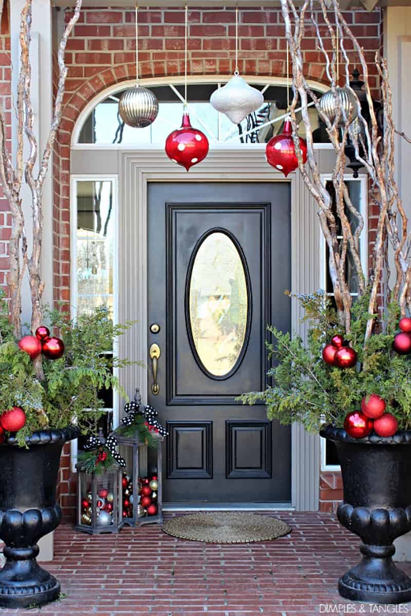 Elegant Black Door with Urns of Greenery and Ornaments Elegant Black Door with Urns of Greenery and Ornaments — Christmas Front Door Decor