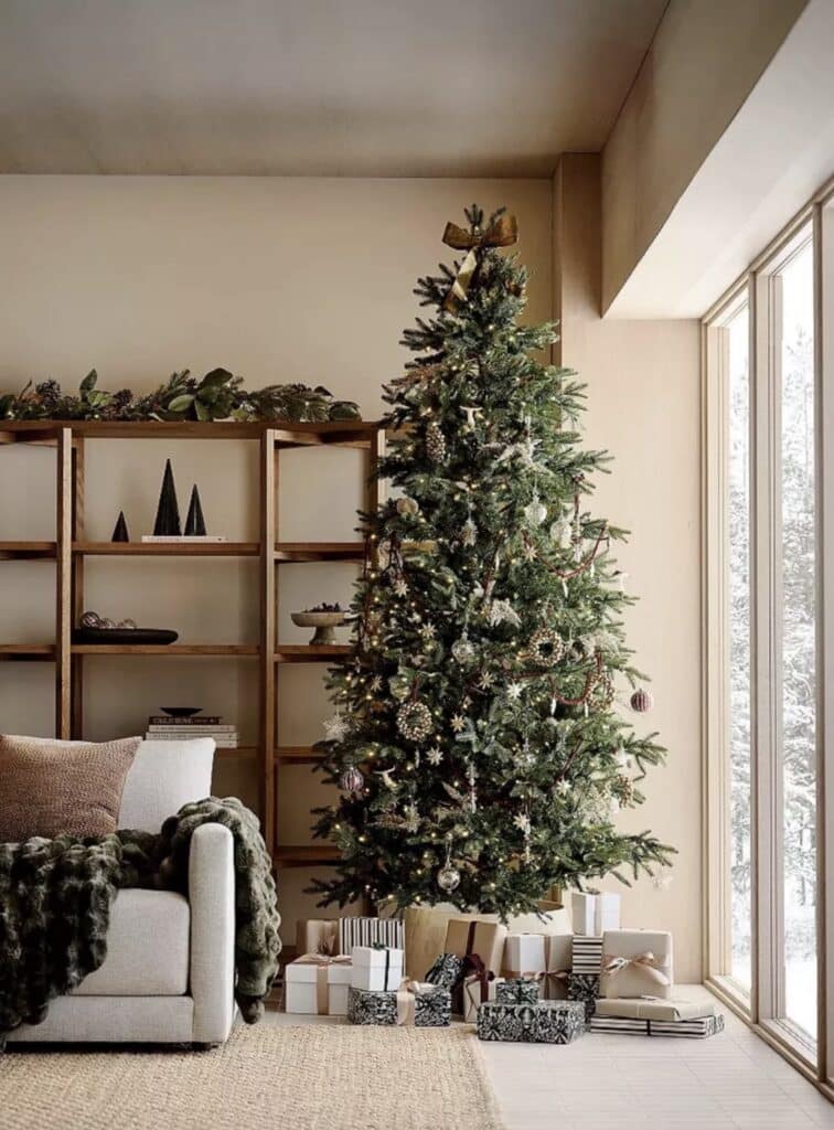 Modern Neutral Living Room with Gold and White Tree and Faux Fur Throw Modern Neutral Living Room with Gold and White Tree and Faux Fur Throw — christmas decor trends 2026
