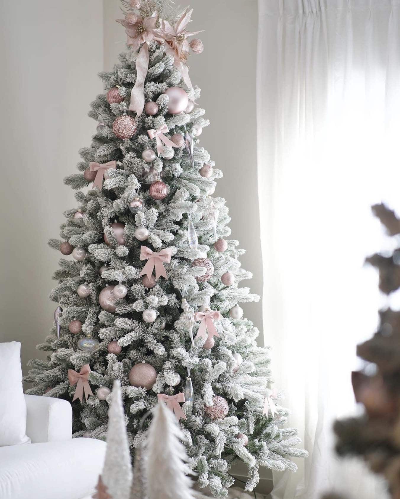 Romantic Elegance: Pink and Rose Gold Flocked Tree Romantic Elegance: Pink and Rose Gold Flocked Tree — Flocked Christmas Tree Decor