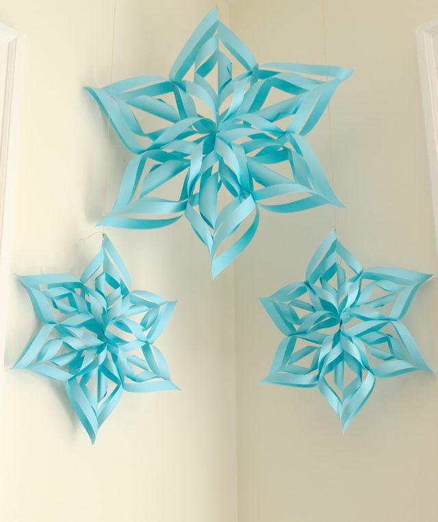Large Light Blue 3D Paper Snowflakes in a Corner