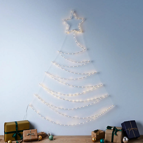 Modern Wall with Cascading Fairy Lights Forming a Tree Shape Modern Wall with Cascading Fairy Lights Forming a Tree Shape — Christmas Fairy Lights Wall