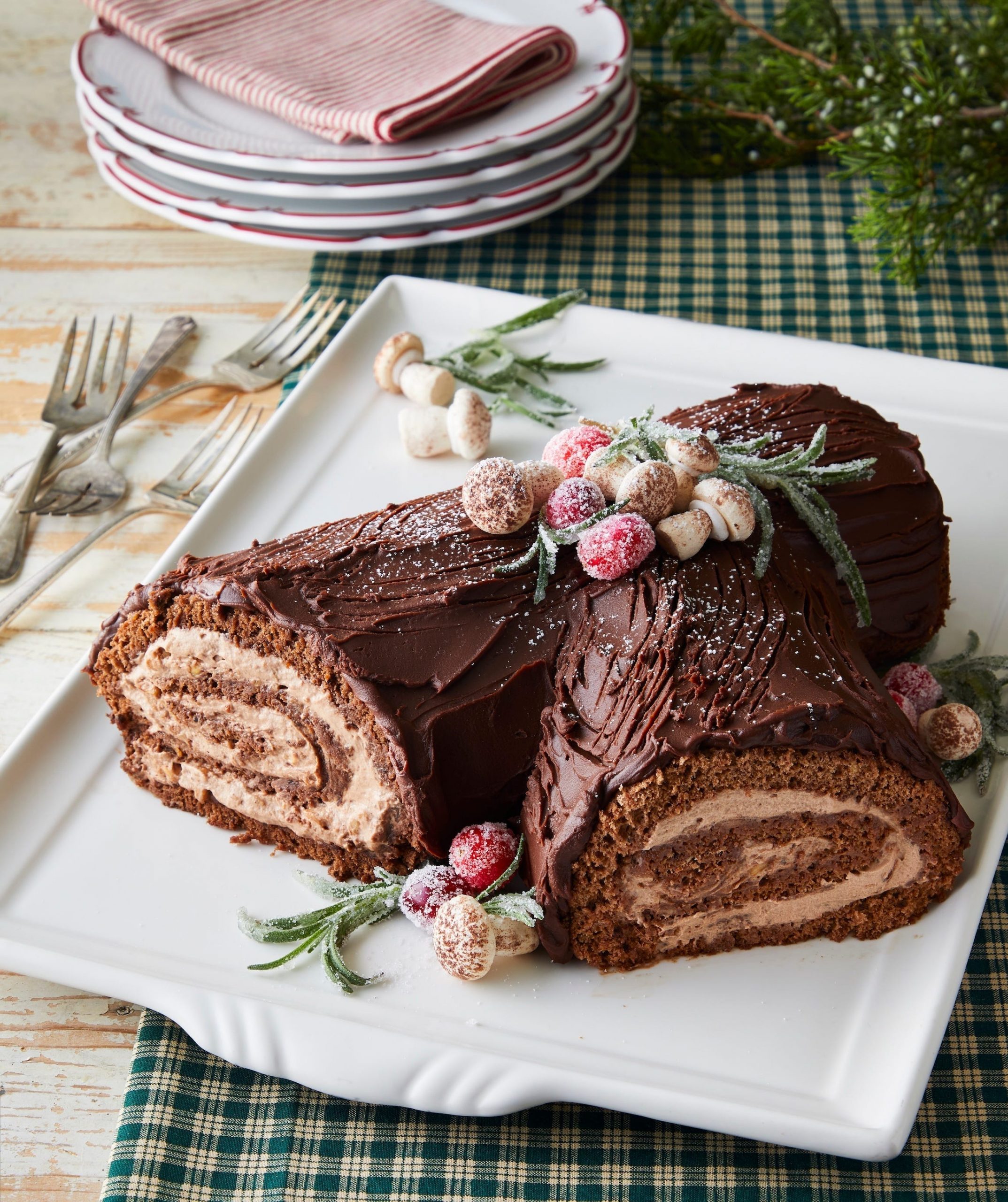 Glossy Chocolate Yule Log with Natural Garnishes — Christmas Dessert Table