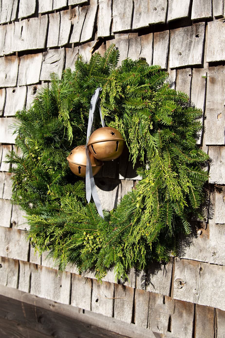 Oversized Gold Bells on a Lush Natural Christmas Wreath — DIY Christmas Wreath