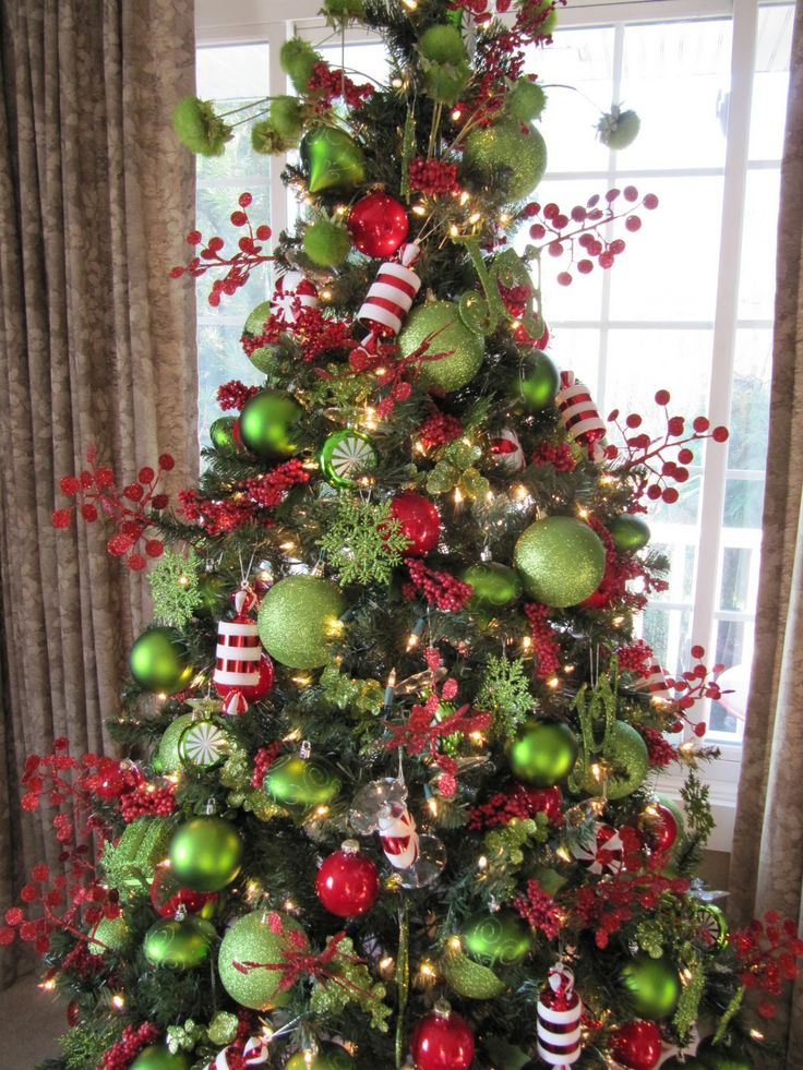 Vibrant Christmas Tree Adorned with Red, Green, and Candy Canes Vibrant Christmas Tree Adorned with Red, Green, and Candy Canes — Red and Green Christmas Decor